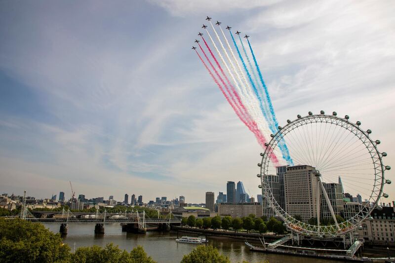 The British RAF Red Arrows conduct a fly past over London to commemorate the 75th Anniversary of Victory in Europe. Reuters