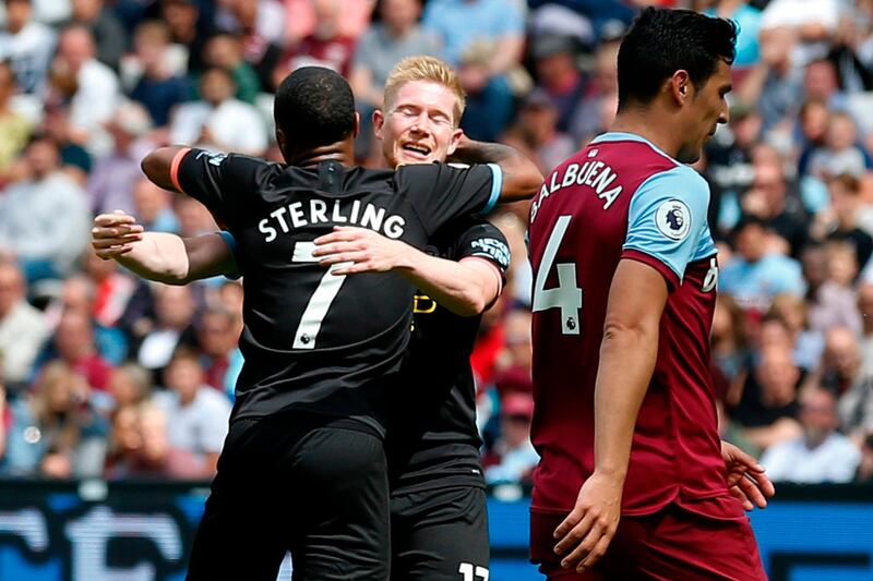 Sterling embraces Kevin De Bruyne after scoring City's second goal. AFP