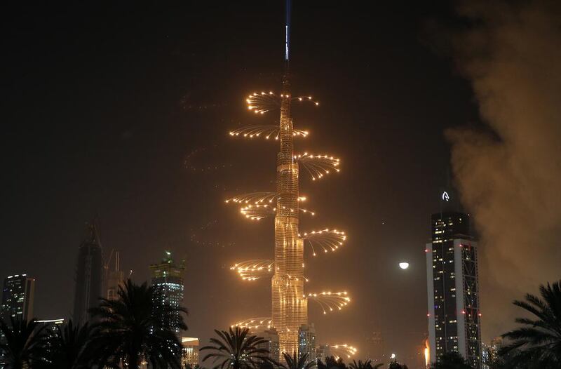Fireworks display goes off at Burj Khalifa in celebration of the new year in Dubai. Pawan Singh / The National 