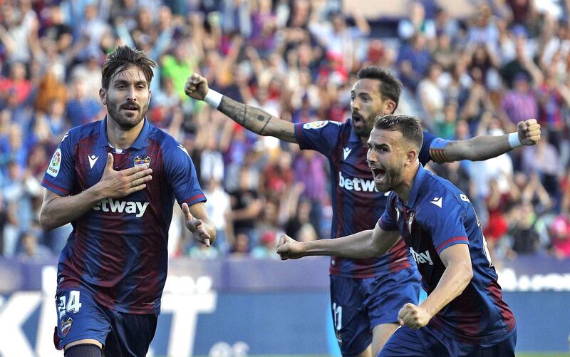 Levante's Jose Campana, left, celebrates the equaliser with teammate Borja Mayoral, right, at the Ciudad de Valencia Stadium.  EPA