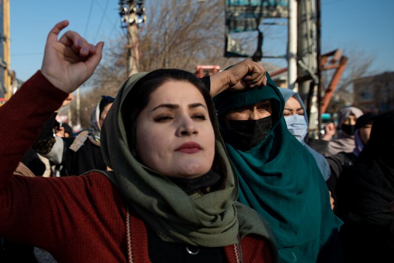 Afghan women protest against the Taliban's decision to ban women from attending universities, on Thursday. Getty Images