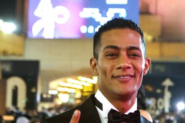 Egyptian actor Mohamed Ramadan poses on the red carpet of the 40th edition of the Cairo International Film Festival in 2018. AFP