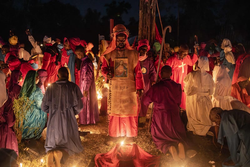 Worshippers of the Legio Maria African Church Mission during the Christmas Eve vigil Mass in a church near Ugunja. AFP