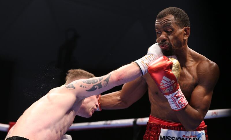 Jamel Herring of the USA in action against Carl Frampton of Northern Ireland.