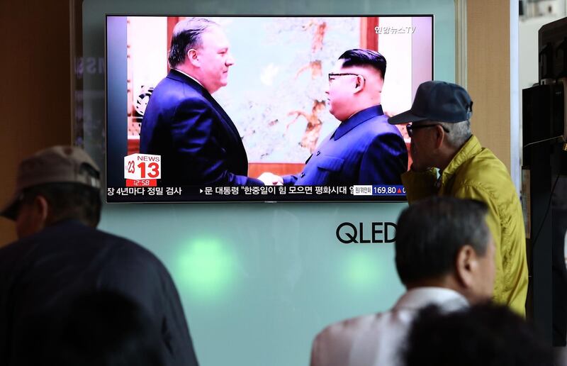 SEOUL, SOUTH KOREA - MAY 09:  South Koreans watch on a screen reporting the U.S. Secretary of State Mike Pompeo visit to North Korea at the Seoul Railway Station on May 9, 2018 in Seoul, South Korea. The U.S. President Donald Trump announced today that the U.S. Secretary of State Mike Pompeo is on his way to North Korea to finalise plans for the summit with his North Korean counterpart Kim Jong-Un. It is Pompeo's second trip to Pyongyang after a meeting with Kim last month as CIA director.  (Photo by Chung Sung-Jun/Getty Images)