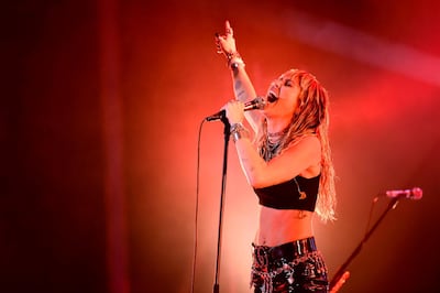 US singer Miley Cyrus performs on stage during a concert at the Sunny Hill Festival in Pristina on August 2, 2019. / AFP / Armend NIMANI
