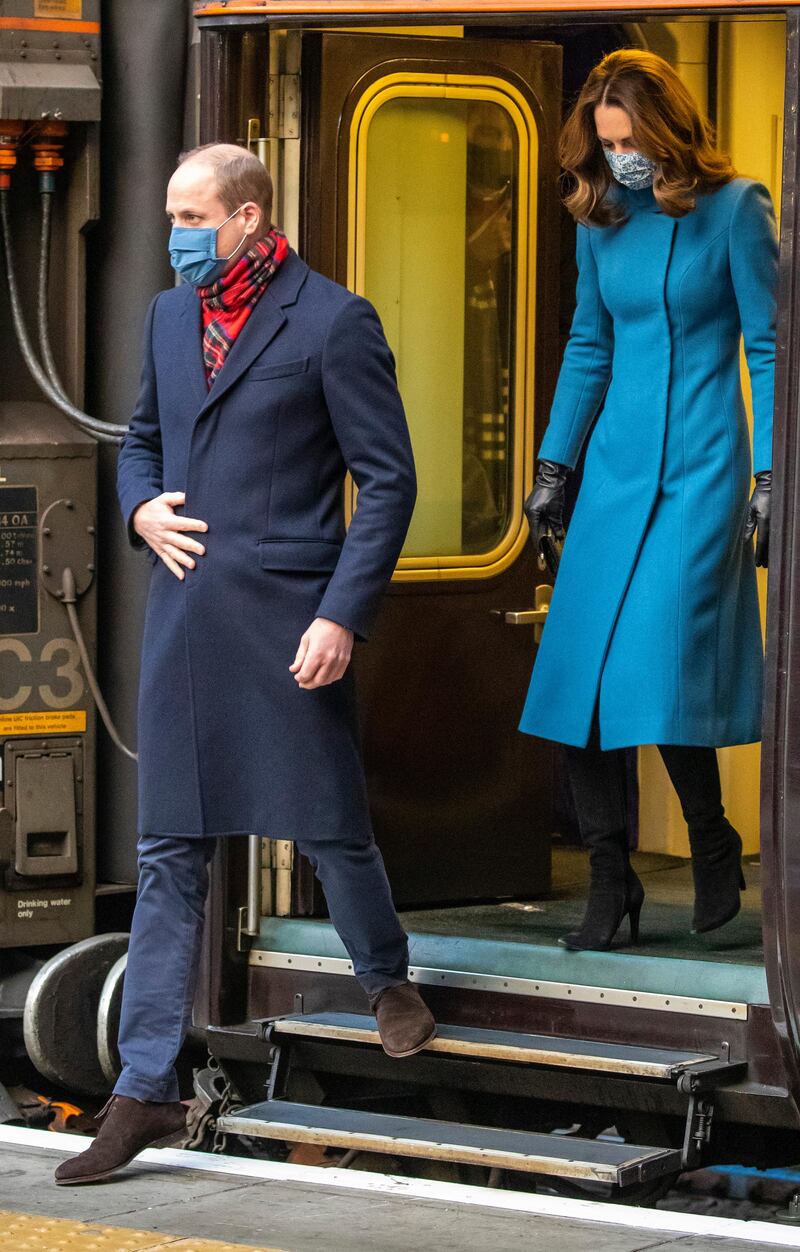 Prince William and Catherine, Duchess of Cambridge step off the train at Edinburgh Waverley Station. Getty Images