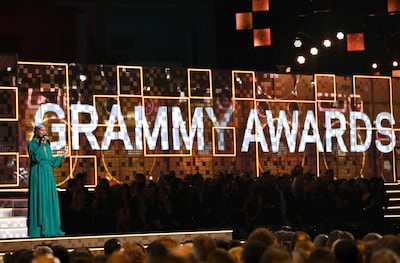 FILE - Host Alicia Keys speaks at the 61st annual Grammy Awards on Feb. 10, 2019, in Los Angeles. The Recording Academy told The Associated Press on Tuesday, Jan. 5, 2021, that the annual show would shift from its original Jan. 31 broadcast to March 14. The Grammys will be held in Los Angeles at the Staples Center. (Photo by Matt Sayles/Invision/AP, File)