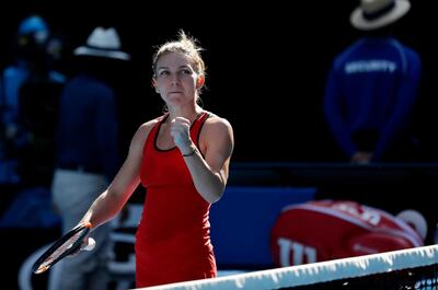 epa06469501 Simona Halep of Romania celebrates winning her quarter final match against Karolina Pliskova of the Czech Republic at the Australian Open Grand Slam tennis tournament in Melbourne, Australia, 24 January 2018.  EPA/MAST IRHAM