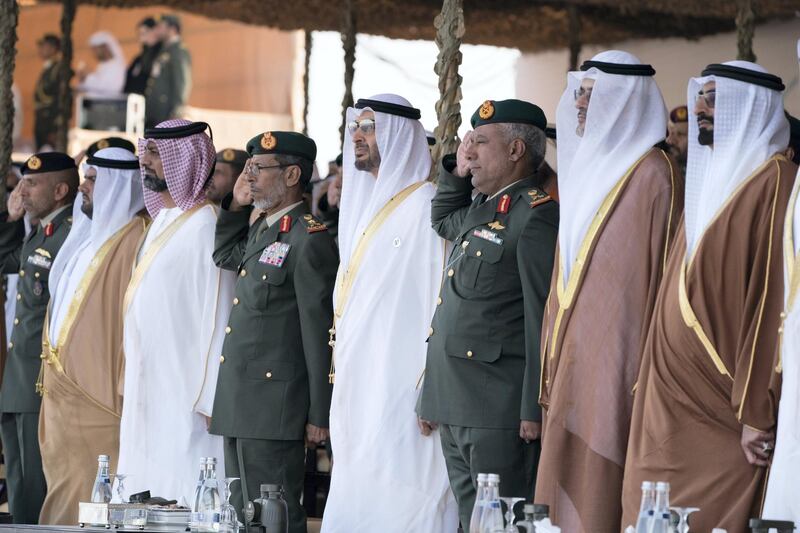 ZAYED MILITARY CITY, ABU DHABI, UNITED ARAB EMIRATES - November 28, 2017: (R-L) HE Mohamed Ahmad Al Bowardi, UAE Minister of State for Defence Affairs, HH Sheikh Sultan bin Mohamed Al Qasimi, Crown Prince of Sharjah, Brigadier Faisal Mohamed Al Shehhi, HH Sheikh Mohamed bin Zayed Al Nahyan, Crown Prince of Abu Dhabi and Deputy Supreme Commander of the UAE Armed Forces, HE Lt General Hamad Thani Al Romaithi, Chief of Staff UAE Armed Forces, HH Sheikh Ammar bin Humaid Al Nuaimi, Crown Prince of Ajman, HH Sheikh Mohamed bin Hamad Al Sharqi, Crown Prince of Fujairah, and HH Major General Pilot Sheikh Ahmed bin Tahnoon bin Mohamed Al Nahyan, Chairman of the National and Reserve Service Authority, attend the graduation ceremony of the 8th cohort of National Service recruits and the 6th cohort of National Service volunteers at Zayed Military City. 

( Hamad Al Kaabi / Crown Prince Court - Abu Dhabi )
—