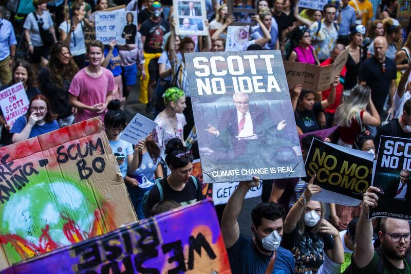 Activists rally for climate action at  Sydney Town Hall. Getty Images