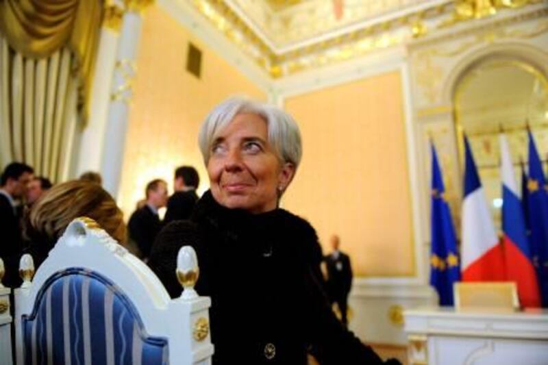 French Minister for Economy Christine Lagarde waits for  Russian Prime Minister Vladimir Putin and his French counterpart Francois Fillon during a press conference after signing intergovernmental and commercial documents in Moscow, on December 9, 2010.  Fillon is on a working visit to Russia and France was ready to transfer military technology if it won a tender to supply Russia with Mistral warships. AFP PHOTO / DMITRY KOSTYUKOV
 *** Local Caption ***  844573-01-08.jpg