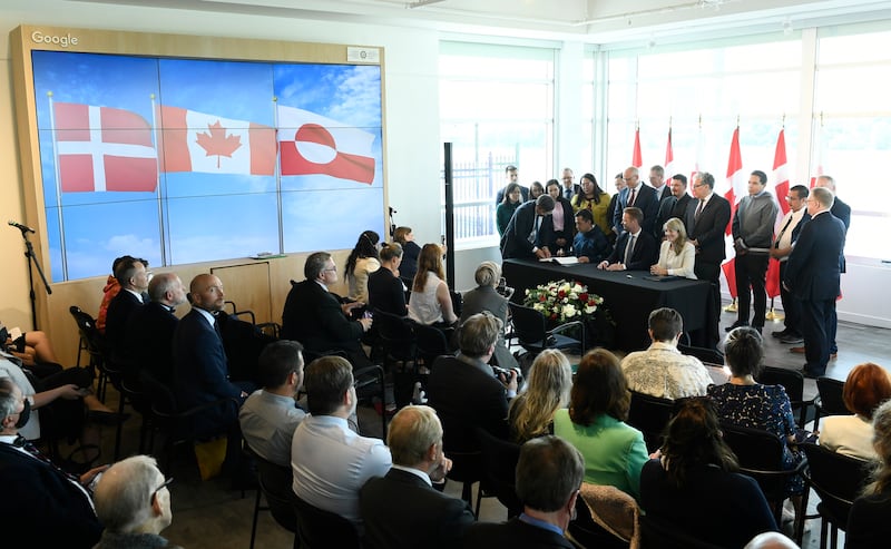 At the signing ceremony in Ottawa, the two sides formally announced a deal to split Hans Island and effectively create the first land border between Canada and Europe. AP