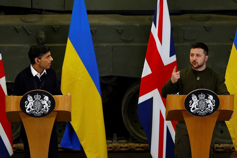 Mr Sunak and Mr Zelenskyy hold a news conference at the military facility in Lulworth. AP