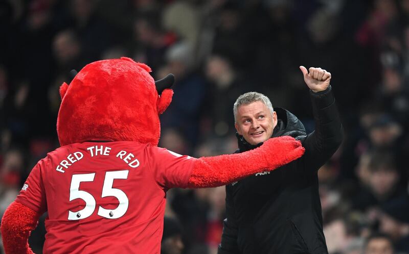 Ole Gunnar Solskjaer enjoys a moment with Fred the Red, the Manchester United Mascot. Getty Images