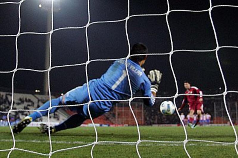 Paraguay's goalkeeper Justo Villar stops the penalty kick of Venezuela's Franklin Lucena. Ivan Franco / EPA