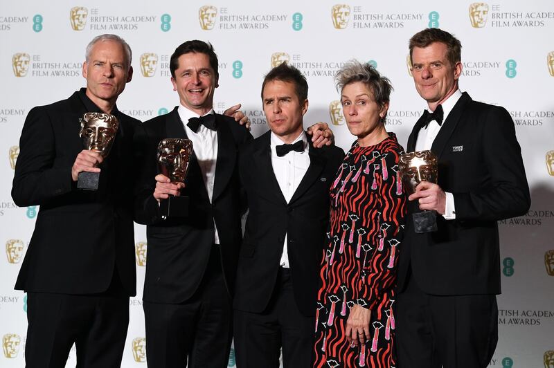 epa06541046 British-Irish filmmaker Martin McDonagh (L) Producer Peter Czernin (2-L), US actor Sam Rockwell (C) and US actress Frances McDormand (2-R) and British producer Graham Broadbent (R) pose in the press room after winning Best Film for 'Three Billboards outside Ebbing, Missouri' during the 71st annual British Academy Film Awards at the Royal Albert Hall in London, Britain, 18 February 2018. The ceremony is hosted by the British Academy of Film and Television Arts (BAFTA).  EPA/ANDY RAIN