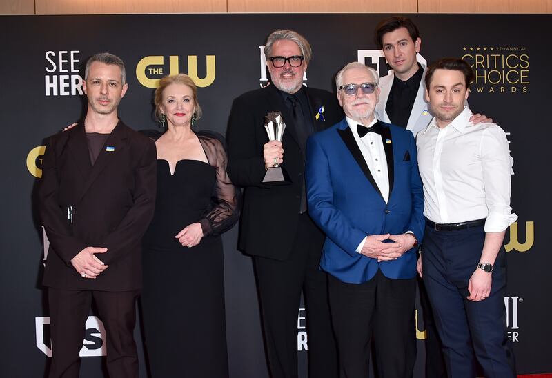 From left, Jeremy Strong, J Smith-Cameron, Scott Ferguson, Brian Cox, Nicholas Braun and Kieran Culkin after their show 'Succession' wins the award for Best Drama Series. AP