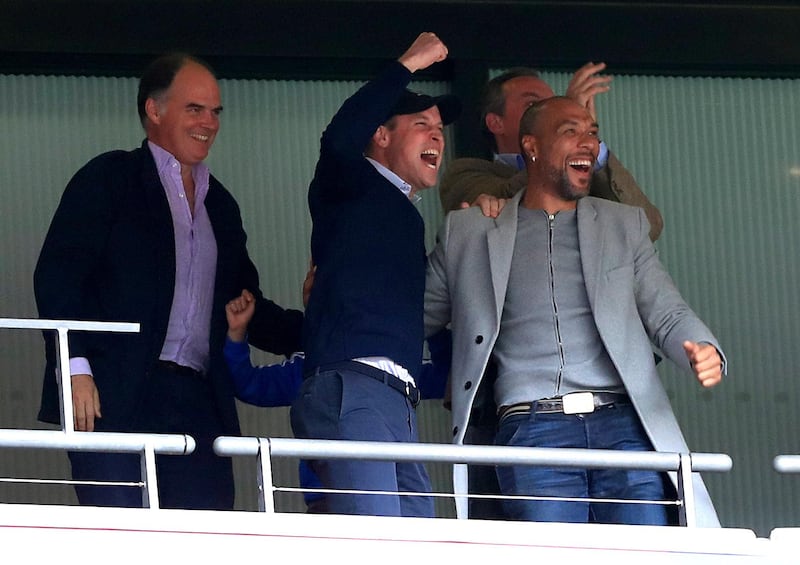 Prince William, second left, and Carew celebrate Villa's first goal. AP Photo