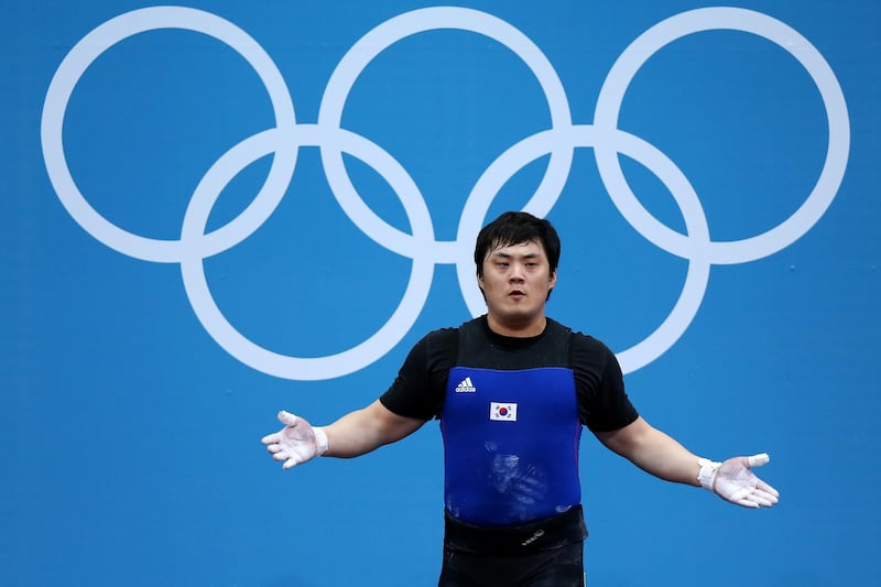 LONDON, ENGLAND - AUGUST 06:  Whaseung Kim of Korea competes in the Men's 105kg Weightlifting on Day 10 of the London 2012 Olympic Games at ExCeL on August 6, 2012 in London, England.  (Photo by Ezra Shaw/Getty Images)