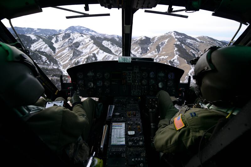 Pilots fly their UH-1N Iroquois over a mountain range near Malmstrom Air Force Base. Photo: US Air Force