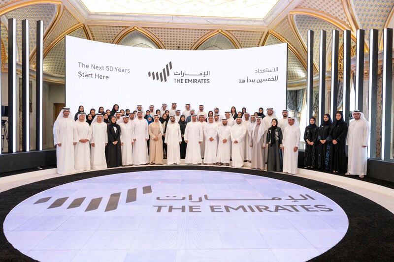 Sheikh Mohammed bin Rashid, Sheikh Mohamed bin Zayed, and UAE ministers unveil the country's new logo. Wam