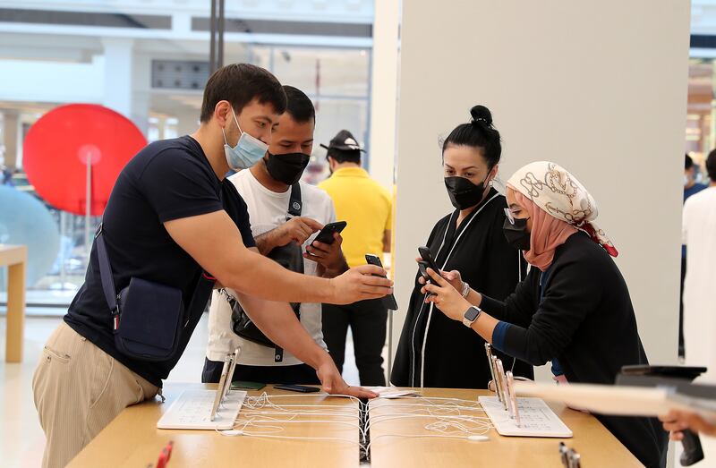 Technology lovers get their hands on the Apple iPhone 13.