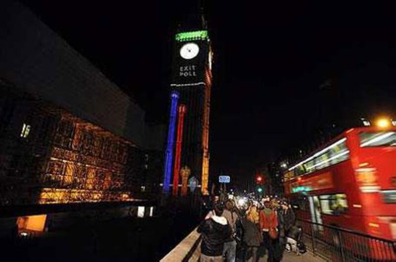 The BBC has projected its exit poll results of the British general elections onto St Stephen's Tower in Central London, which houses the famous Big Ben bell, just after polling stations have closed across the country on Thursday, May 6, 2010.