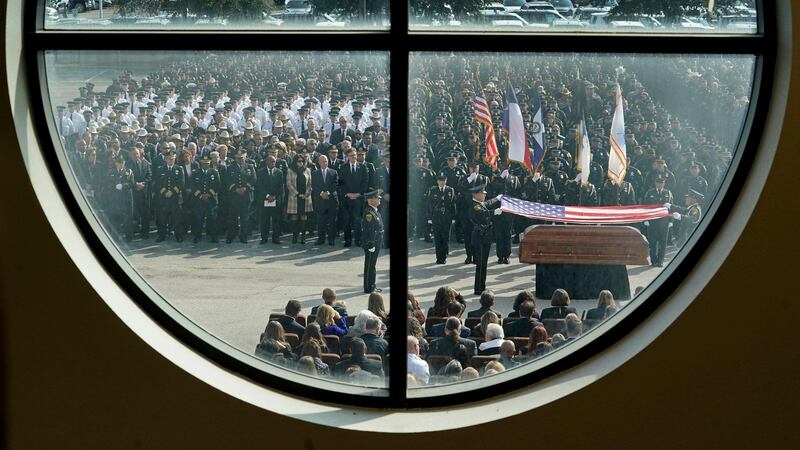 A Houston Police honour guard seen during funeral of Houston Police Sgt Christopher Brewster. AP