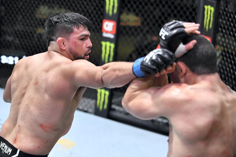 LAS VEGAS, NEVADA - APRIL 17: (L-R) Kelvin Gastelum punches Robert Whittaker of Australia in a middleweight fight during the UFC Fight Night event at UFC APEX on April 17, 2021 in Las Vegas, Nevada. (Photo by Chris Unger/Zuffa LLC) *** Local Caption *** LAS VEGAS, NEVADA - APRIL 17: (L-R) Kelvin Gastelum punches Robert Whittaker of Australia in a middleweight fight during the UFC Fight Night event at UFC APEX on April 17, 2021 in Las Vegas, Nevada. (Photo by Chris Unger/Zuffa LLC)