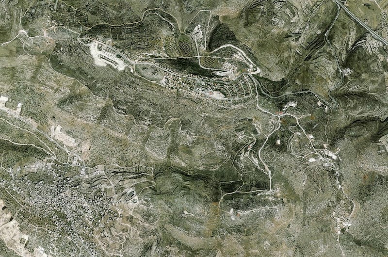 A handout photo made available by the Peace Now organization showing an aerial view of the Israeli settlement of Yizhar in the West Bank. EPA