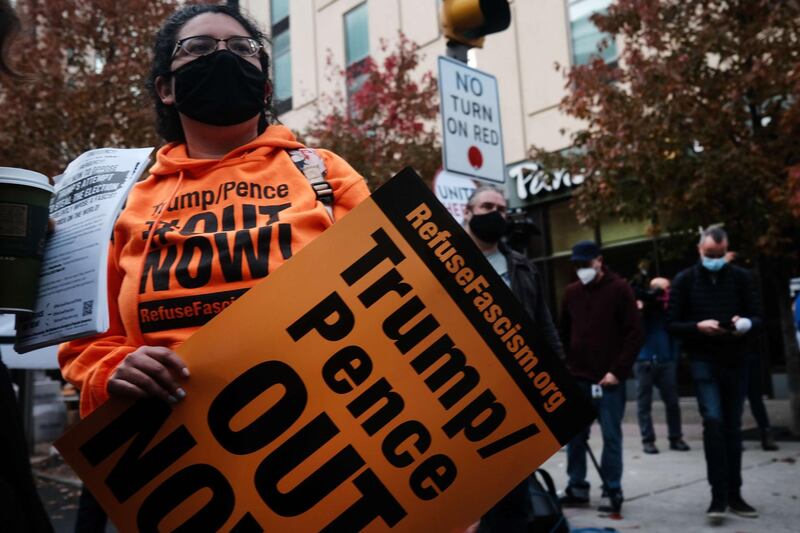 Protesters gather outside of the Philadelphia Convention Centre. AFP