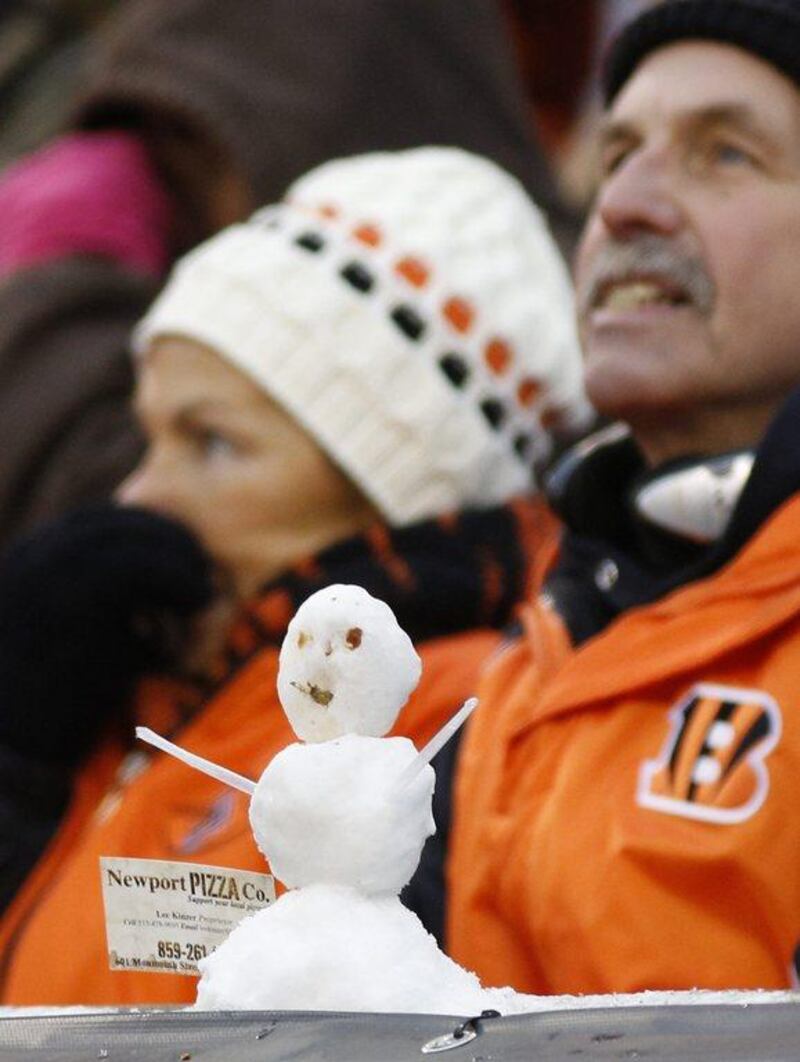 A fan constructed a small snowman in Cincinnati, Ohio, where the Cincinnati Bengals hosted the Indianapolis Colts. David Kohl / AP