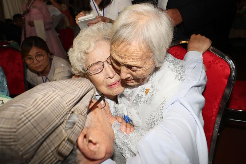 South Korean Jo Hye-do, 86, hugs her North Korean sister Jo Soon-do, 89, during an inter-Korean family reunion at the Mount Kumgang resort on the North's southeastern coast. AFP