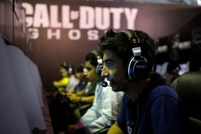 Dubai, United Arab Emirates, September 26, 2013:      Youngsters who waited up to three hours to try the new Call of Duty game play during Games 13 at the Dubai International Convention and Exhibition Centre in Dubai on September 26, 2013. Christopher Pike / The National

Reporter: Mohammed AlKhan
Section: News *** Local Caption ***  CP0926-games13-009.JPG