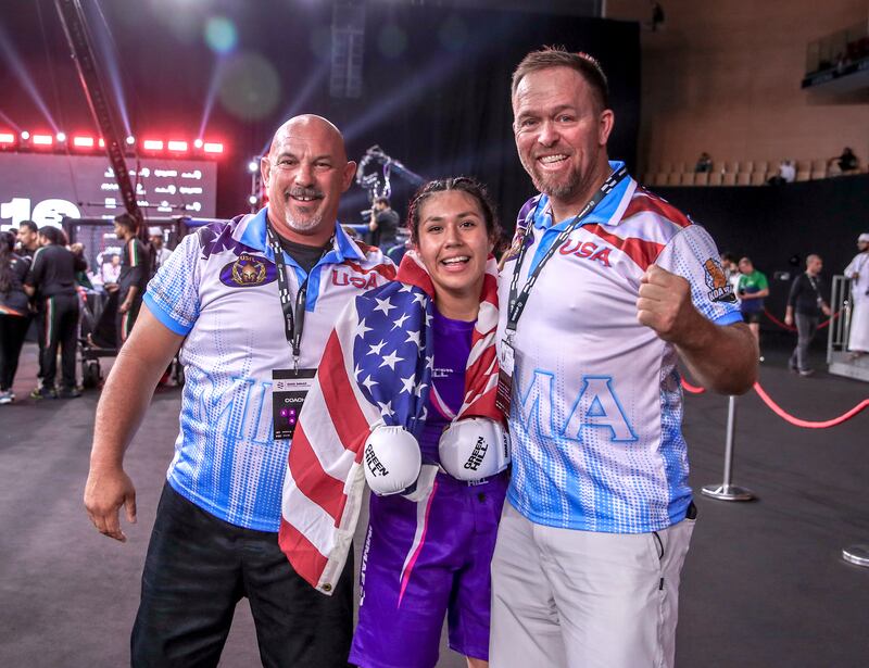 Citlali Perez of Team USA celebrates after defeating Palak Nag of India. 