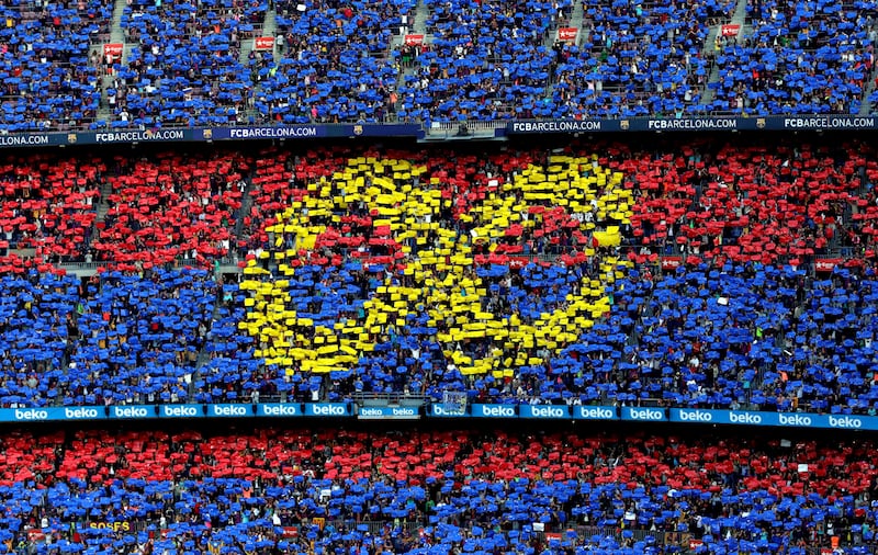 Fans pay tribute to midfielder Andres Iniesta during his last game for Barcelona, prior the Liga match between Barcelona and Real Sociedad at Camp Nou stadium in Madrid, Spain, 20 May 2018. EPA