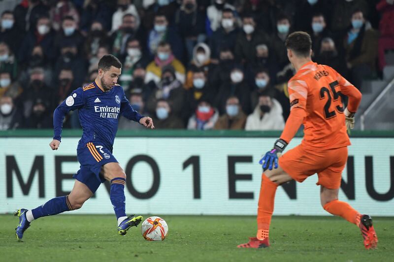 Eden Hazard rounds Elche goalkeeper Axel Werner to score Real Madrid's winner in the Copa del Rey last-16 clash at Estadio Manuel Martínez Valero on Thursday,  January 20, 2022. AFP