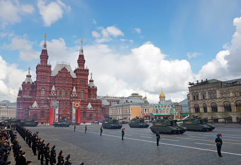 Russian armoured vehicles, including MSTA-S self-propelled howitzers, drive through Red Square. Reuters