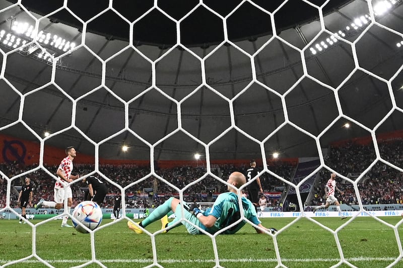 Canada's goalkeeper Milan Borjan concedes the second goal to Marko Livaja. AFP