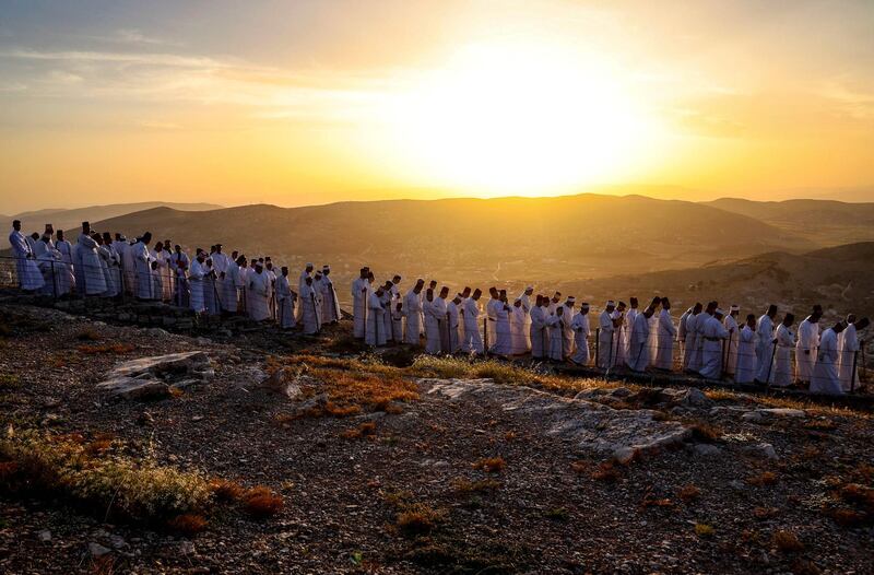 Samaritan worshippers arrive to take part in a Passover ceremony on top of Mount Gerizim, near the northern West Bank city of Nablus. Samaritans are a community of a few hundred who trace their lineage to the Israelites led by the biblical prophet Moses out of Egypt. AFP