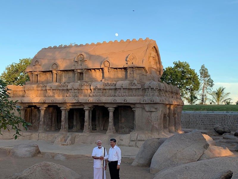 The Chinese and Indian leaders toured several sites in the historical south Indian town. Mr Xi arrived in India on Friday and left on Saturday after a round of meetings. AP Photo