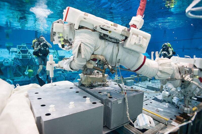 PHOTO DATE:  10 MAY 2013
LOCATION: Neutral Buoyancy Lab - Underwater
SUBJECT: NBL EVA dive with Terry Virts and Samantha Cristoforetti in support of ISS ammonia leak trouble-shooting.
PHOTOGRAPHER: NBL/Bill Brassard/Kelly Rives/Lauren Hansen