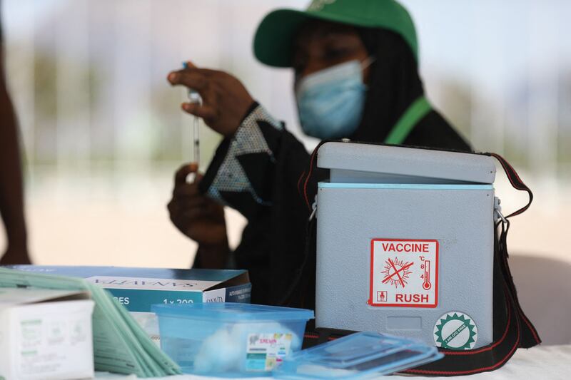 A health worker prepares to administer the AstraZeneca jab in Abuja, Nigeria. AFP