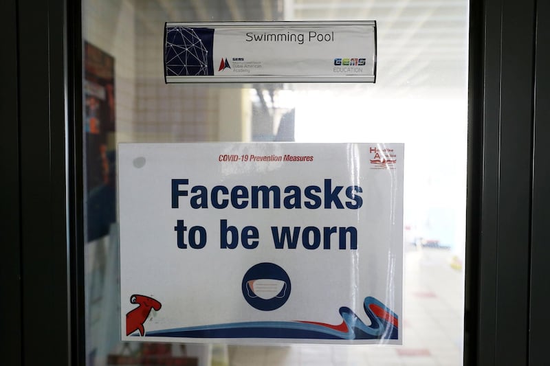 DUBAI, UNITED ARAB EMIRATES , August 10 – 2020 :- Face mask message at the Dubai American Academy in Dubai. New Covid safety setup in different areas of the school such as hand sanitizer, safety message, social distancing stickers pasted on the floor, thermal cameras will be installed at the entrance of the school. School will open on 30th August. (Pawan Singh / The National) For News/Online/Instagram. Story by Sarwat Nasir