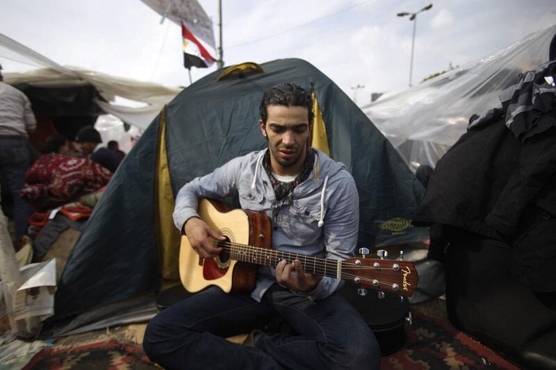 Ramy Essam’s song Irhal (Leave) became an anthem for protesters at Egypt’s Tahrir Square. Michael Robinson Chavez / Los Angeles Times via Getty Images