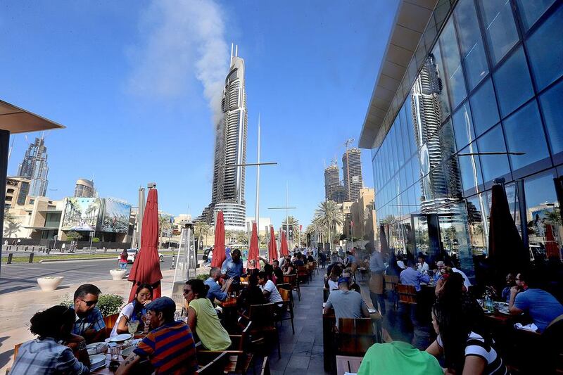 Some restaurants were open near The Address Downtown Dubai hotel on New Year’s Day. Satish Kumar / The National