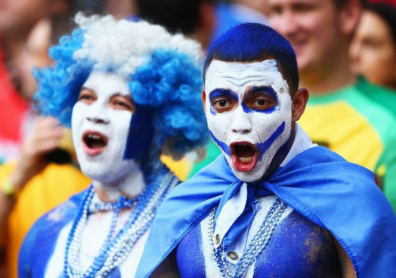 Honduras fans enjoy the the atmosphere prior to their nation's match against France on Sunday at the 2014 World Cup in Porto Alegre, Brazil. Ian Walton / Getty Images