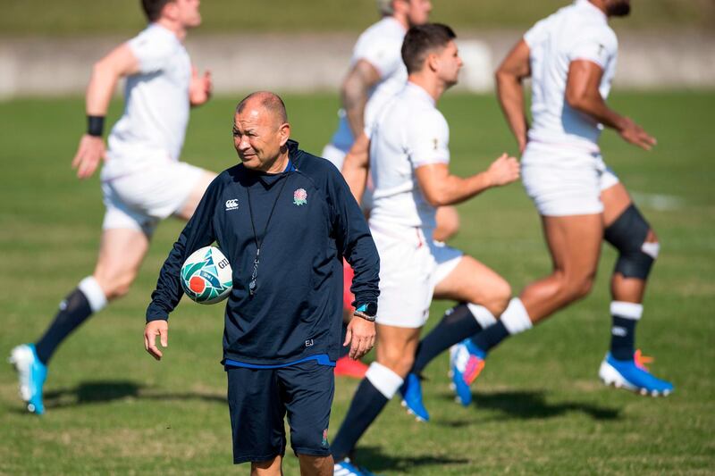 England's head coach Eddie Jones leads the captain's run training session at the Fuchu Asahi Football Park in Tokyo, Japan. AFP