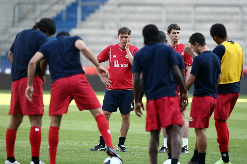 Lille coach Rudi Garcia watches his team during a training session in Genk, on August 19, 2009. AFP